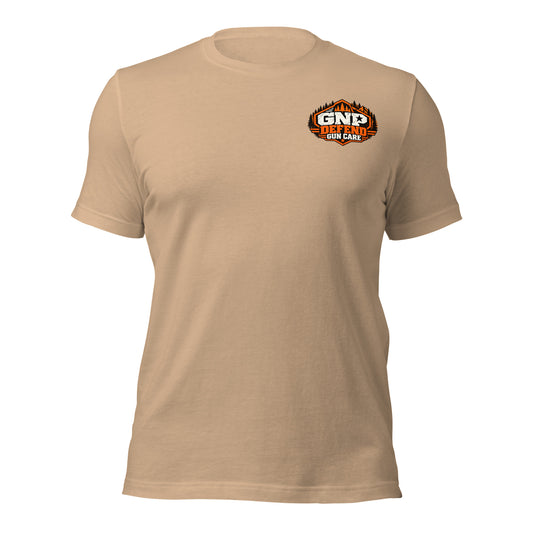 Front of a Tan tee with the small orange GNP Defend Gun Care crest on the left chest